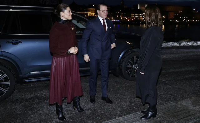 Crown Princess Victoria wore a burgundy pleated faux leather skirt from By Malina, and burgundy wool jacket