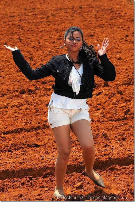 Swetha Basu Prasad Hot in White Short Pants 9