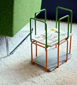 lacquered steel magazine rack