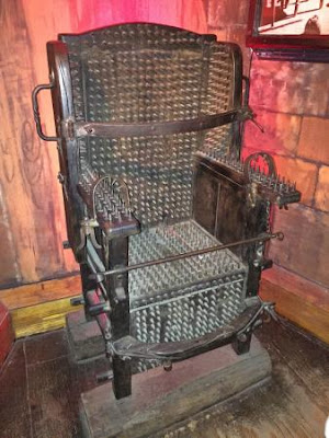 the chair of torture image, judas chair image