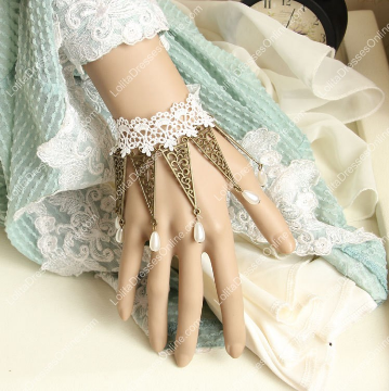 http://www.lolitadressesonline.com/white-lace-vintage-pearls-punk-lolita-bracelet-p-947.html