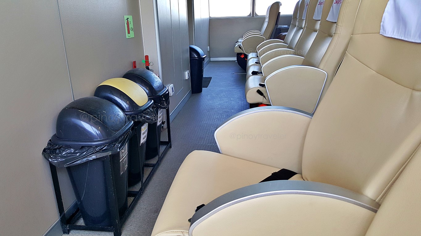 unsightly trash bins on the airconditioned Business Class section of St. Sariel 2GO