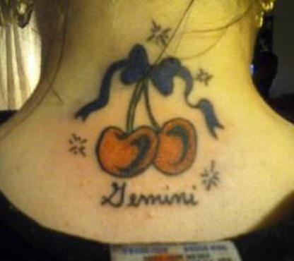 Bow and Cherry Tattoo on back of Neck