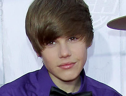 pictures of justin bieber 2011 new. justin bieber one world.
