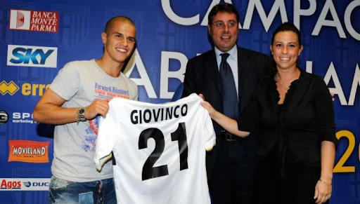 Sebastian Giovinco holds the Parma jersey during his official presentation