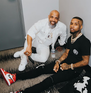 Tory Lanez with his dad Sonstar Peterson