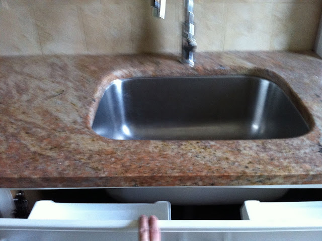 kitchen sink tip-out tray