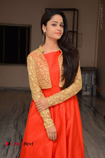 Telugu Actress Divya Nandini Stills in Orange Sleeveless Gown at Chennai Chaitrama Movie le Launch Event  0004.JPG