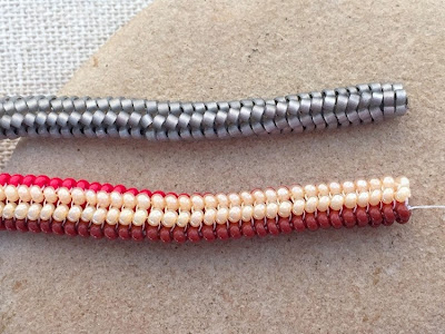 Two tubular herringbone bracelets using cylinder beads and round beads