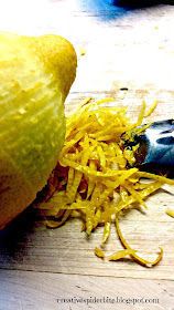 zesting a lemon for dandelion pesto 