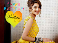 madhuri dixit, peele rang ki poshak mei madhuri ka dilkash photo download saath hi designer choodiyan and kaan ke tops