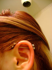 double piercing on ear ,industrial piercing