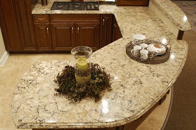 Which is less expensive quartz or granite