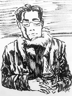 Man wearing glasses in fur and black holding a coffee cup.
