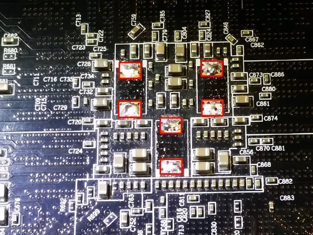 把GPU 背面的三顆560uF 拆出來看看