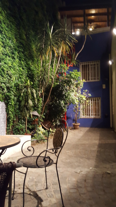 Casa chorizo patio at night with lighting