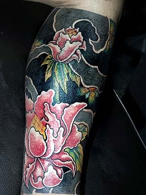 rose flower tattoo. foot tattoo ideas. rose flower