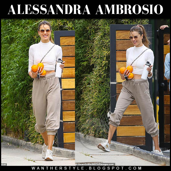 Alessandra Ambrosio in white crop top and beige sweatpants