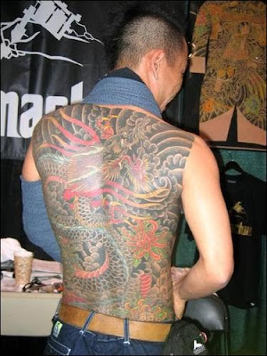 Japanese dragon tattoos can wrap around the body and flatter the contours of 