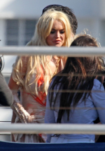 lindsay lohan miami photo shoot. Lindsay Lohan left little to