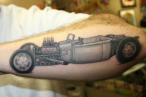 Well have a quick look through these pictures of various cool car tattoos