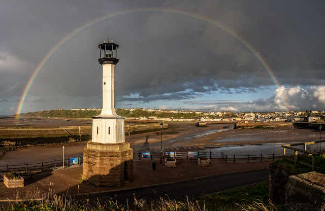 Photo of a rainbow over Maryport lighthouse