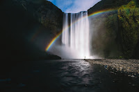 River and Rainbow - Photo by Sorasak on Unsplash