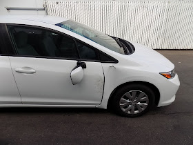 2013 Honda Civic with auto body damage before repairs at Almost Everything Auto Body.