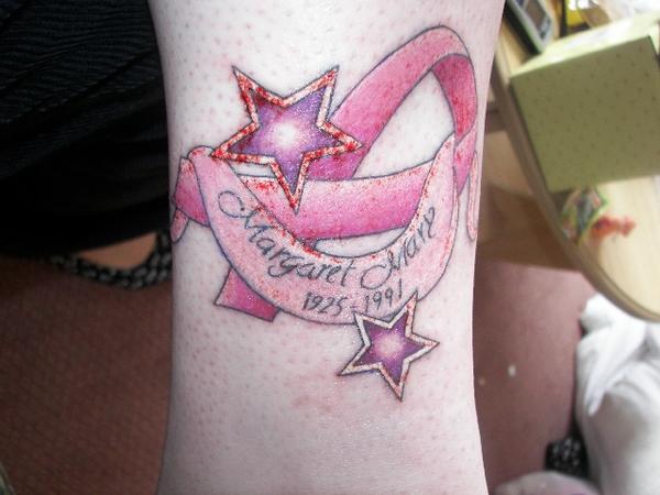 Warped Tour: Pink Ribbon tattoo in honor of his mother who is a Breast