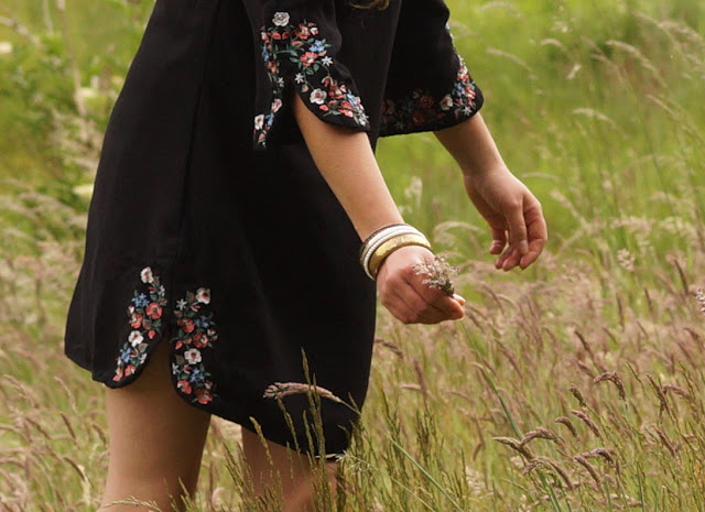 embroidered black dress