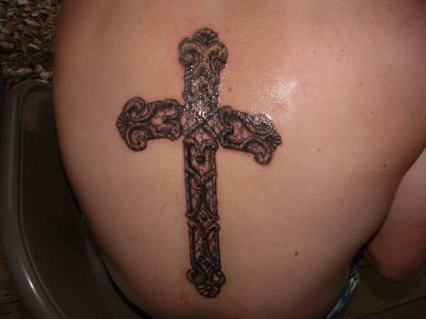 Cross Tattoo on the Back