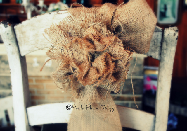 all burlap rosette to upscale your chairs