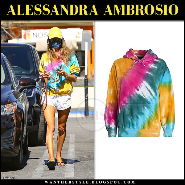 Alessandra Ambrosio in yellow tie dye sweatshirt and shorts