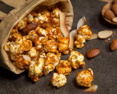 Homemade Caramel Corn ♥ KitchenParade.com, made in the microwave in a paper bag so no mess, no fuss. Fun for kids!