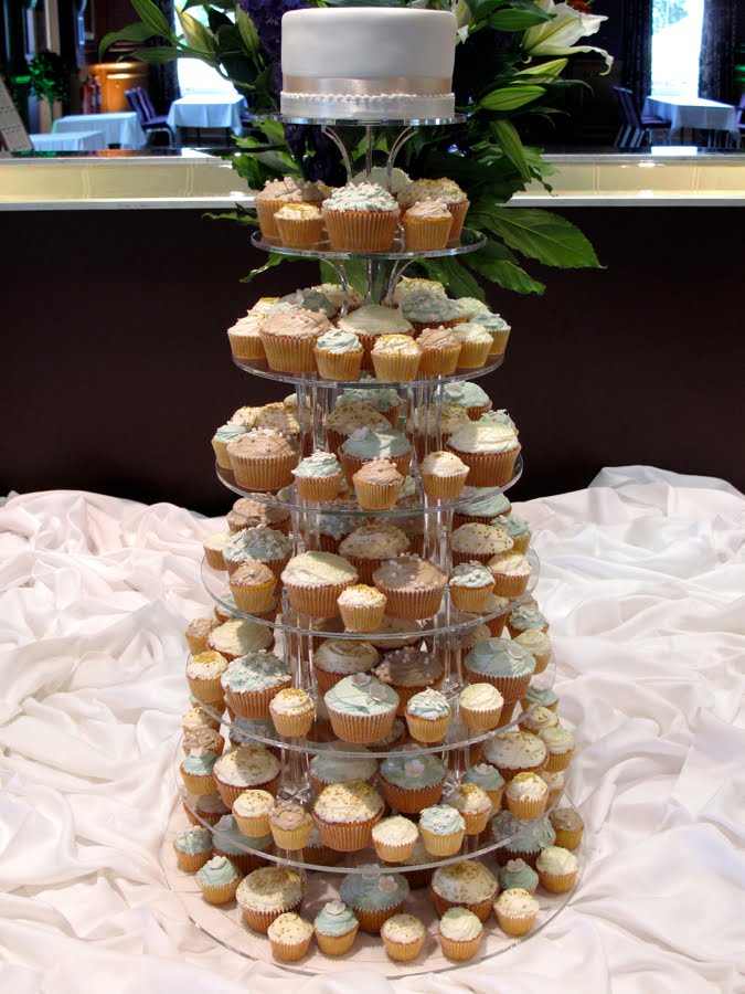 Taupe and light teal wedding tower Here's a lovely tower of cupcakes we did