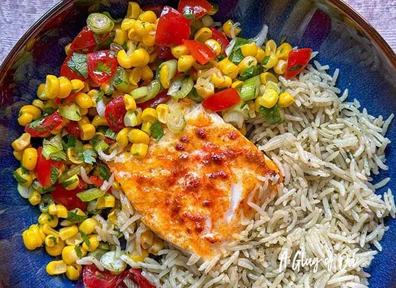 Air fryer cod with sweetcorn salsa and rice.