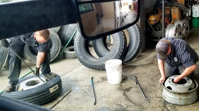 Industrial Tire Service workers working hard and fast