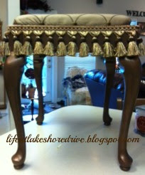 alt="queen anne stool makeover tutorial with martha stewart metallic bronze and fringe"