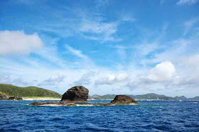 islands, outcroppings,blue skies