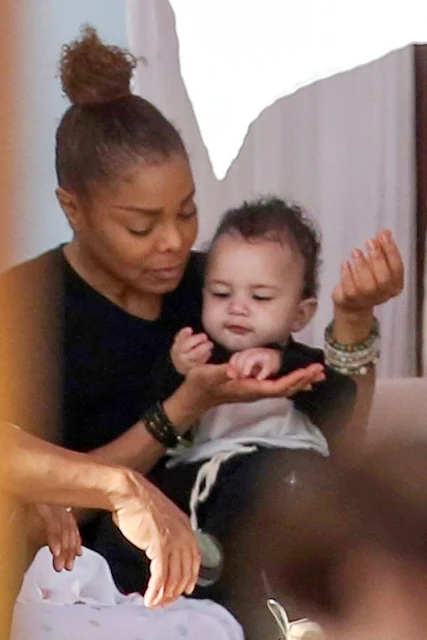 Janet Jackson pictured feeding her baby son Eissa in Miami Beach, Florida