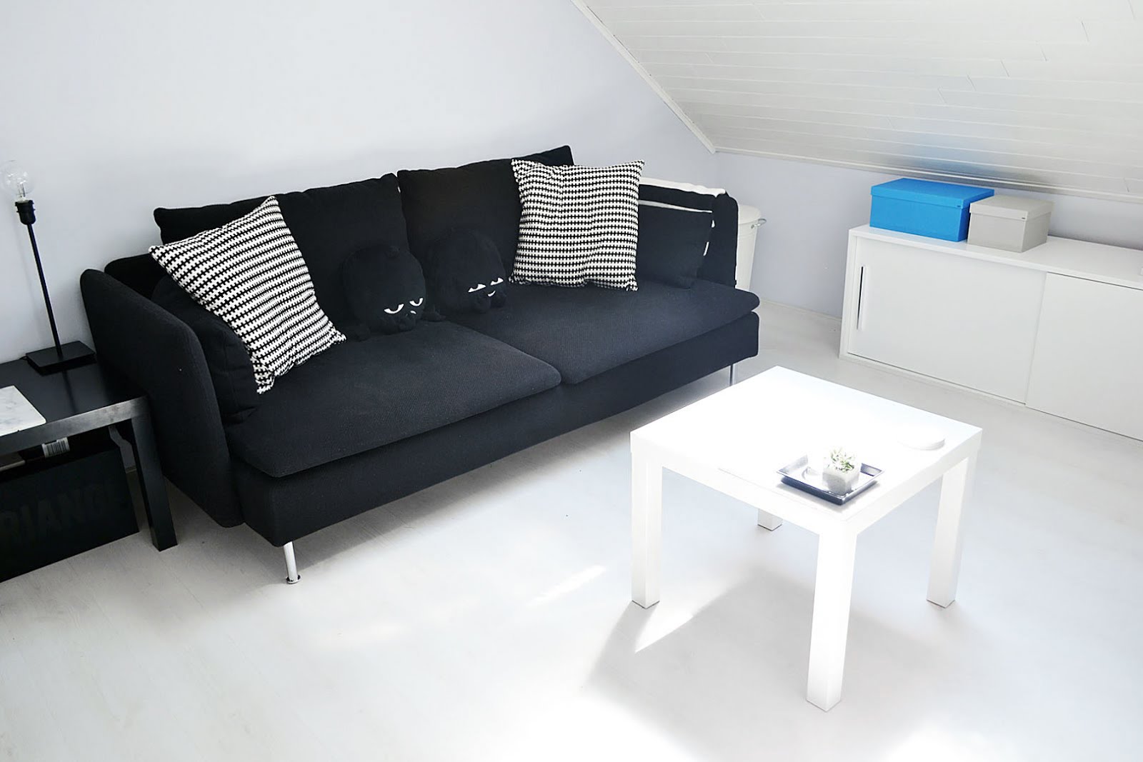 IKEA soderhamn, black cover, ikea lack table white, monkis, animals, black sofa, 