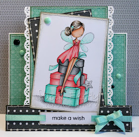 Stepper card featuring fairy with a pile of presents (image from ADU)