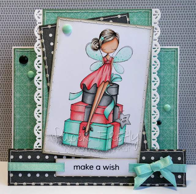 Stepper card featuring fairy with a pile of presents (image from ADU)