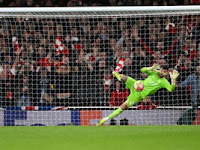Arsenal berhasil melaju ke perempat final Liga Champions UEFA setelah memenangkan adu penalti melawan Porto