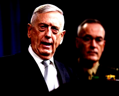 Defense Secretary Jim Mattis, joined by Joint Chiefs Chairman Gen. Joseph Dunford, speaks at the Pentagon, Friday, April 13, 2018, on the U.S. military response, along with France and Britain, in response to Syria's chemical weapon attack on April 7.