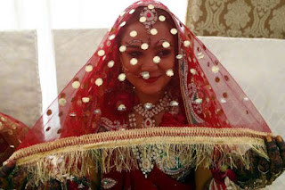 A bride is seen at a mass wedding ceremony in southern Pakistani port city of Karachi