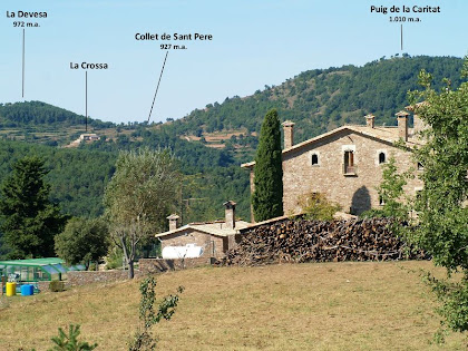 Vista de Postius i dels turons que envolten L'Estany