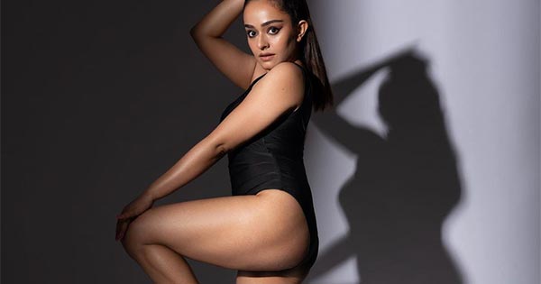 Apoorva Arora in black swimsuit shows off her sexy legs and fine body - see  latest viral hot photos.