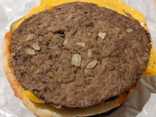 McDonald's Cheeseburger beef patty close-up