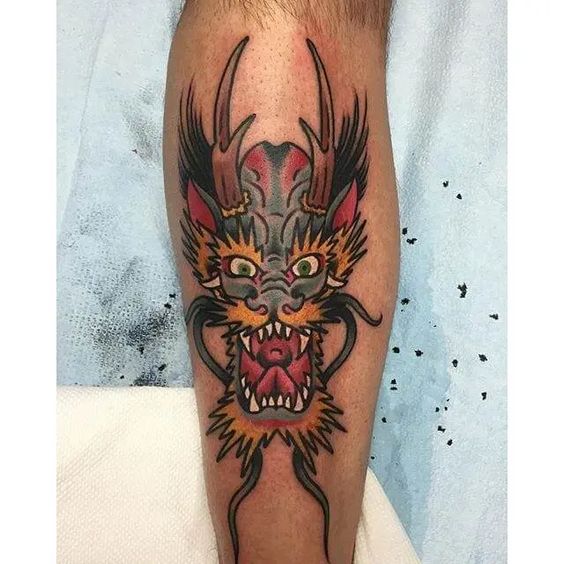 japanese-dragon-colourful-head-tattoo